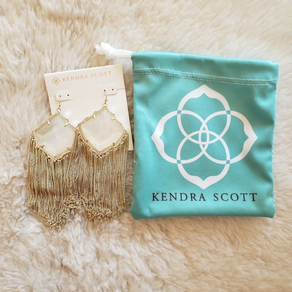 Kendra Scott earrings with gold tassels